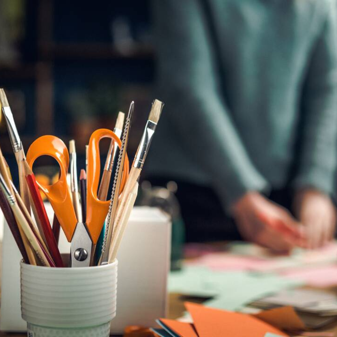 Fiskars 21cm scissors stored in desk organizer with office supplies