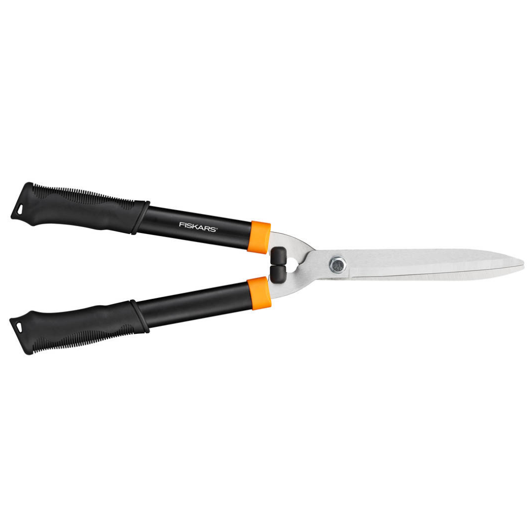 A pair of Fiskars Solid hedge shears with black handles and orange accents.