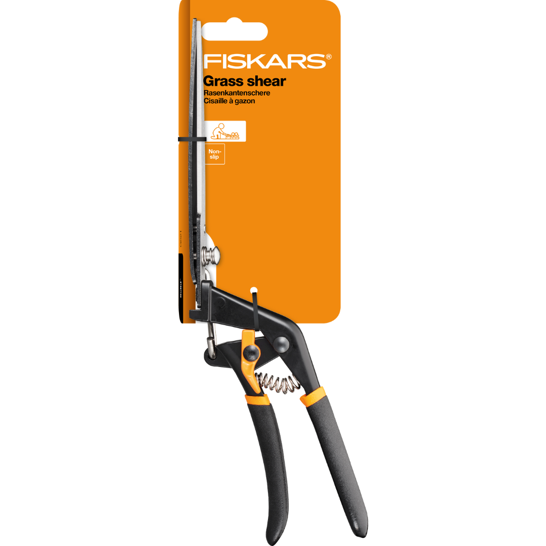 Fiskars grass shear with packaging on a white background